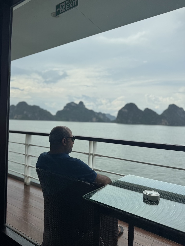Relaxing on the deck overlooking Halong Bay